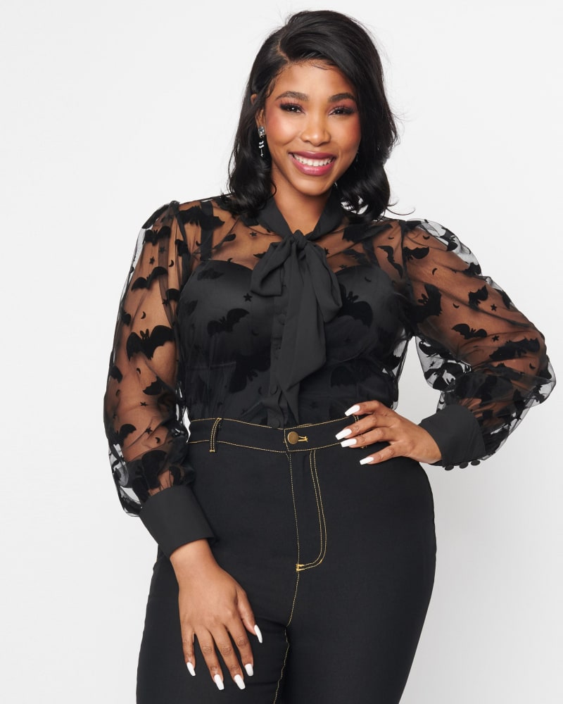 Front of a model wearing a size 1X Unique Vintage Black Bats Mesh Gwen Blouse in Black by Unique Vintage. | dia_product_style_image_id:301892